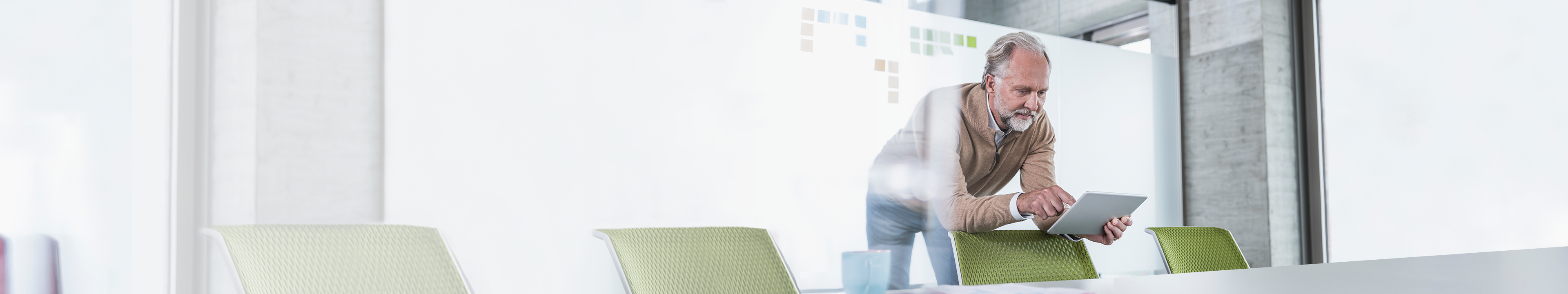 Young woman sitting on floor with laptop